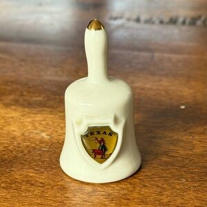 Source Unknown Cream Bell with Texas Emblem